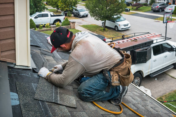 Professional Roofing technician working in Fairport, NY